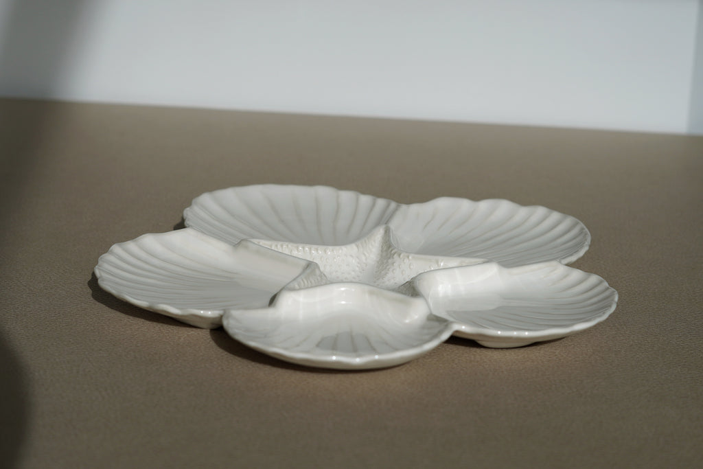Borrelschaal Shell wit keramiek lifestyle styling - Néva Living